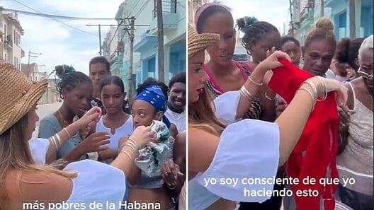 Turista española regala ropas y juguetes en plena calle habanera