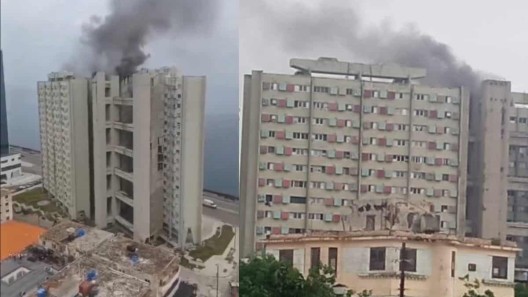 Reportan ahora mismo incendio en gran edificio del Vedado, La Habana (videos)